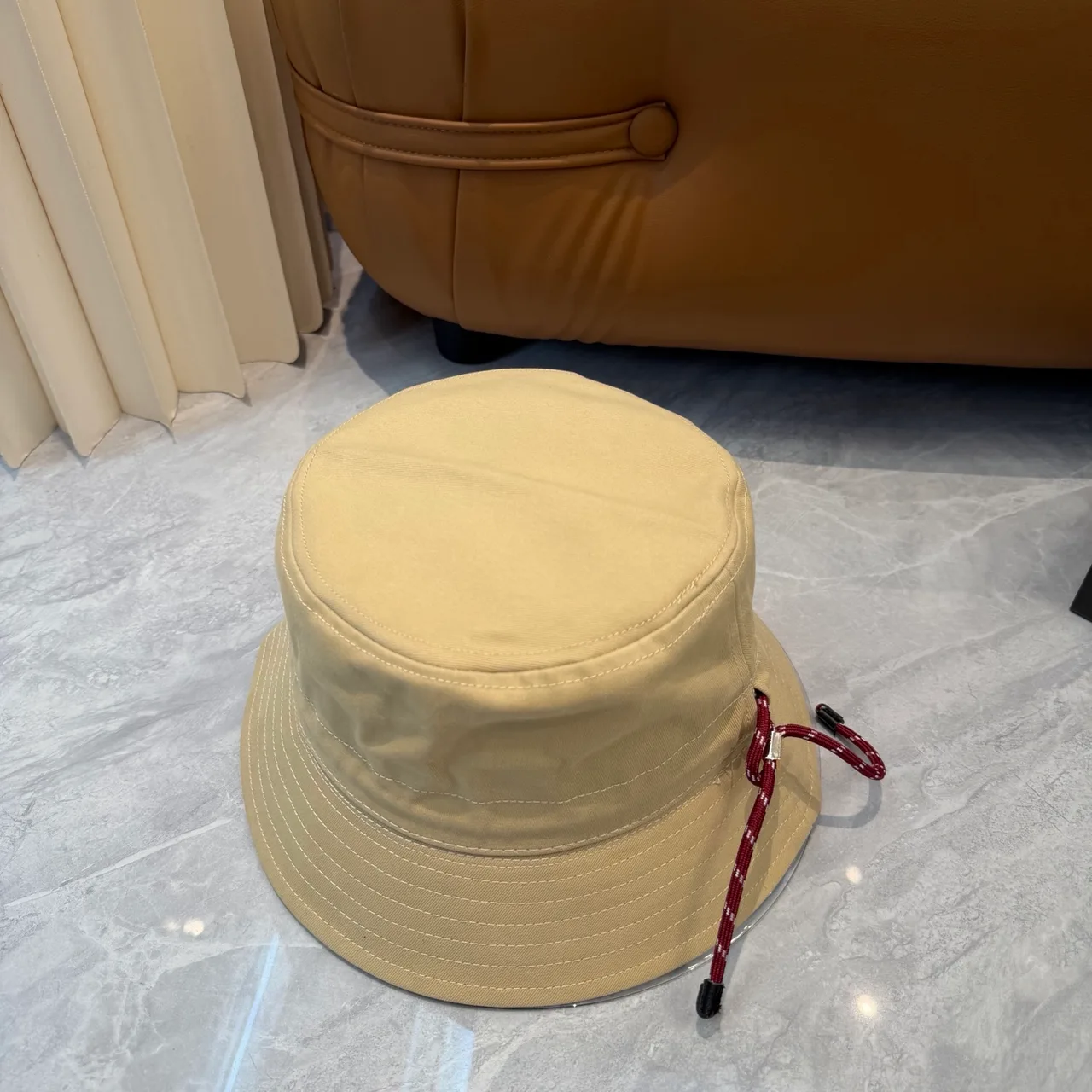 Miu Miu Bucket Hat in Beige · view 3