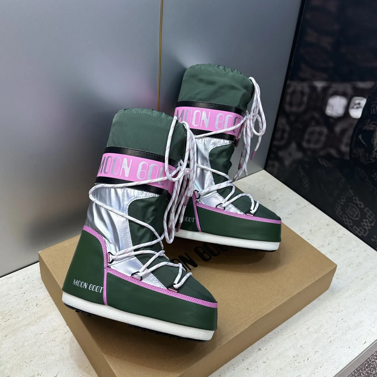 Moon Boot Lace-Up Snow Boots in Green · view 1