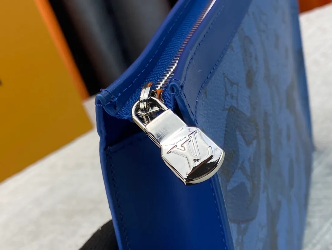 Louis Vuitton Cowhide Canvas Clutch in Blue · view 6