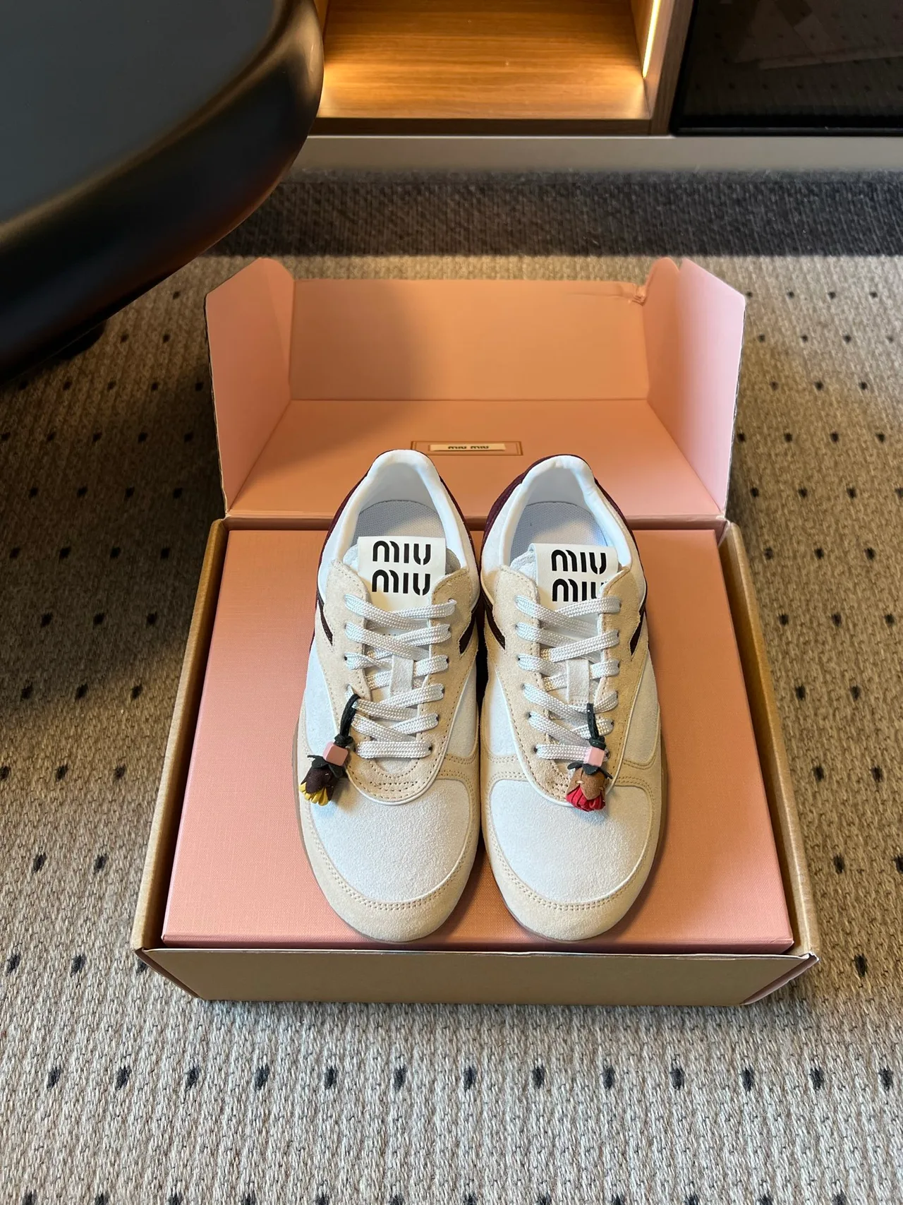 Miu Miu Low-Top Sneakers in Cream · view 1