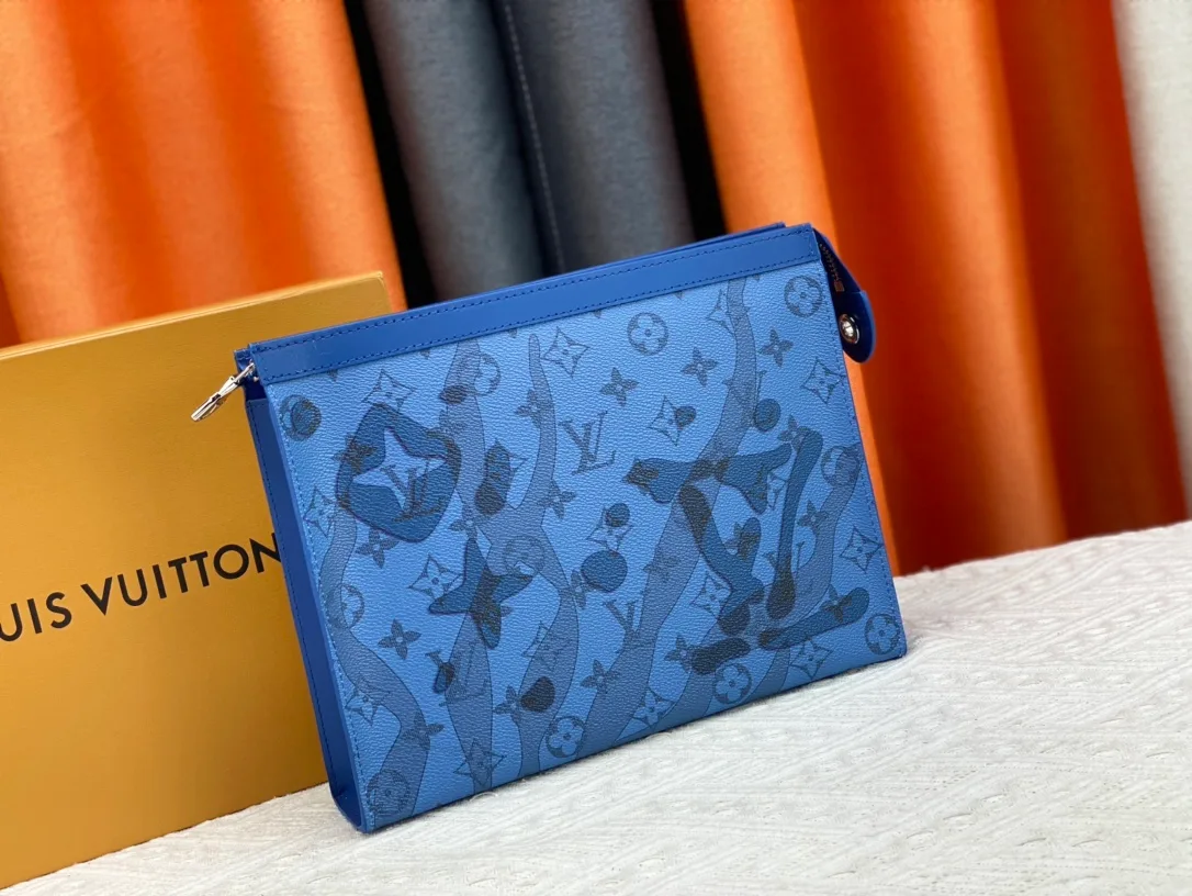 Louis Vuitton Cowhide Canvas Clutch in Blue · view 2