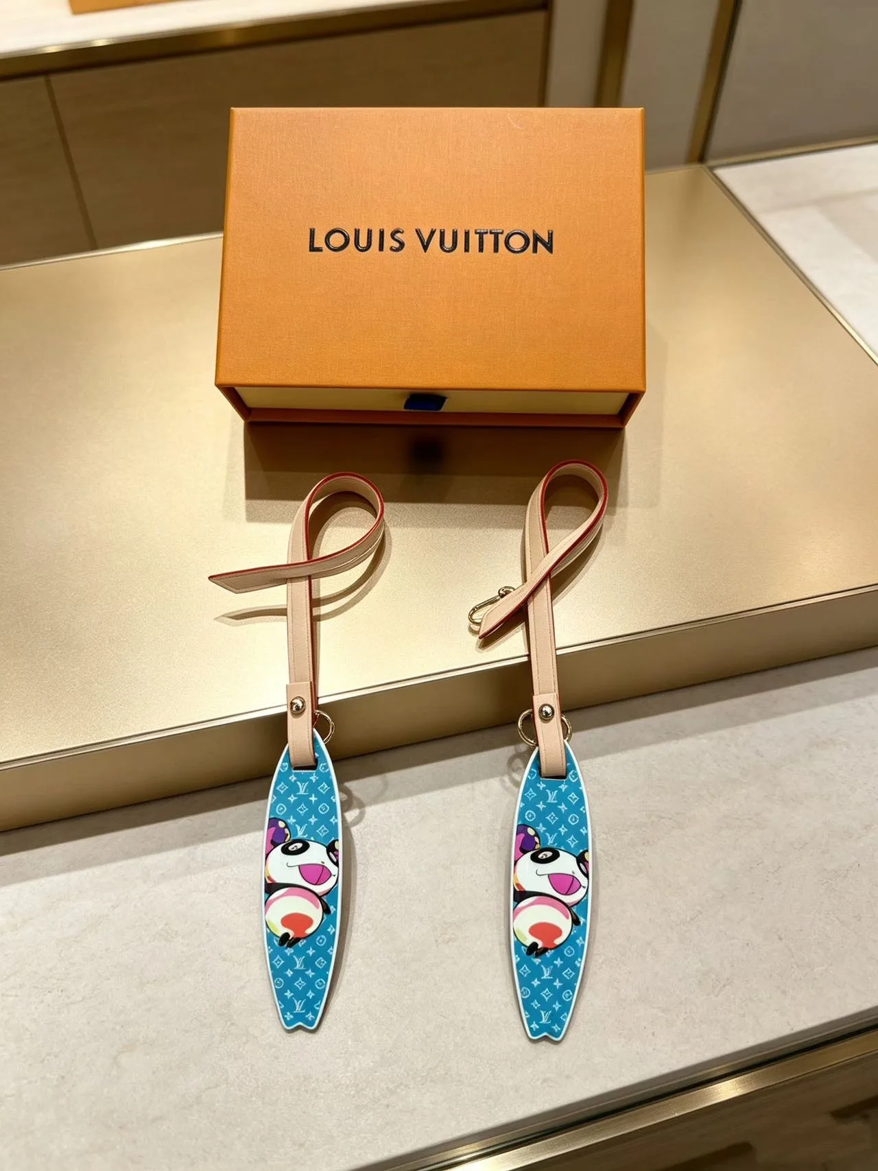 Louis Vuitton Glossy Reversible Surfboard Keychain in Blue · view 1