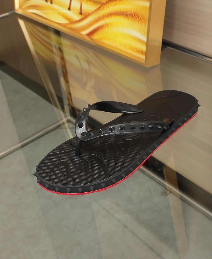 Christian Louboutin Studded Flip-Flops in Black · view 7