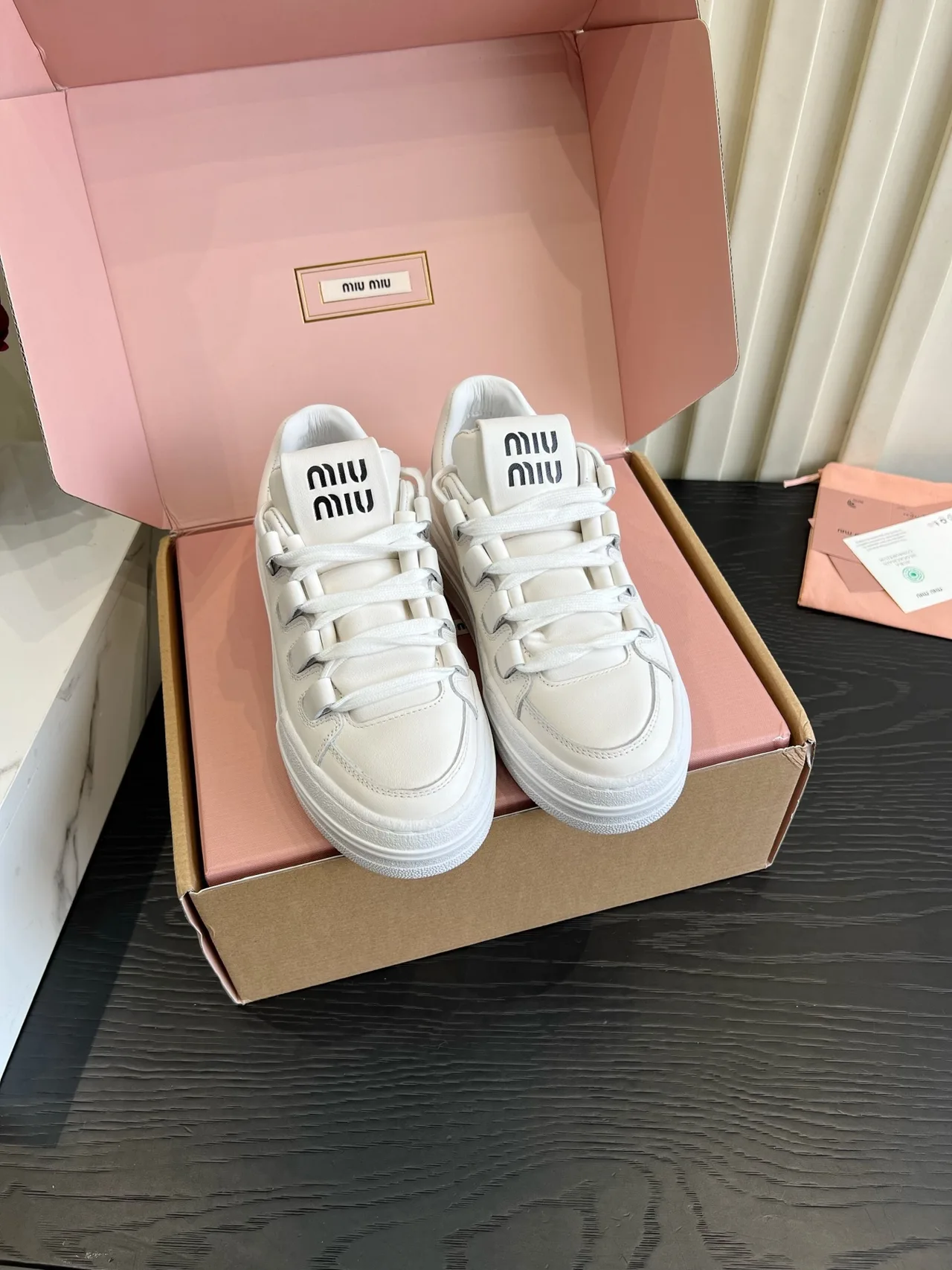 Miu Miu Cowhide Lace-Up Sneakers in White · view 1