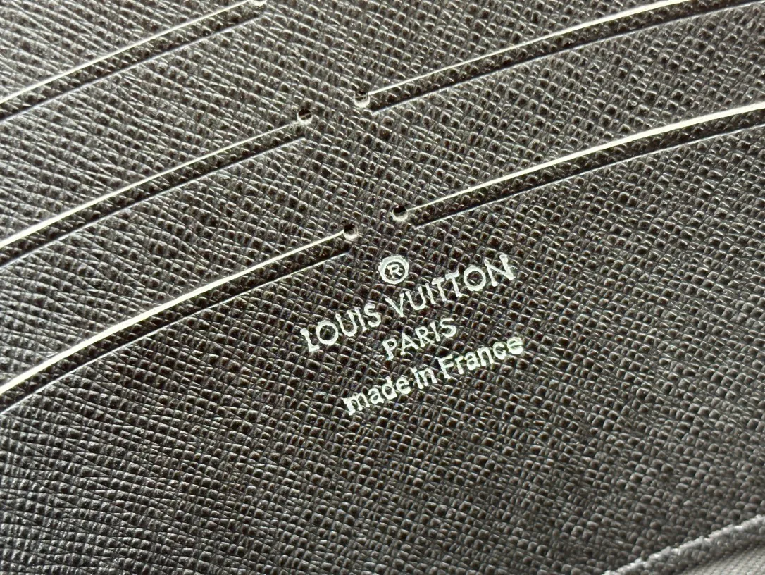 Louis Vuitton Canvas Clutch in Brown · view 8