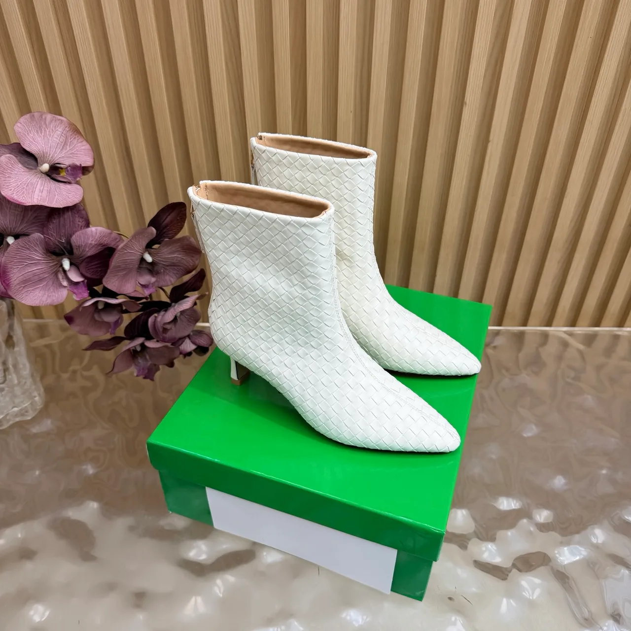 Bottega Veneta Pointed-Toe Woven Ankle Boots in White · view 1