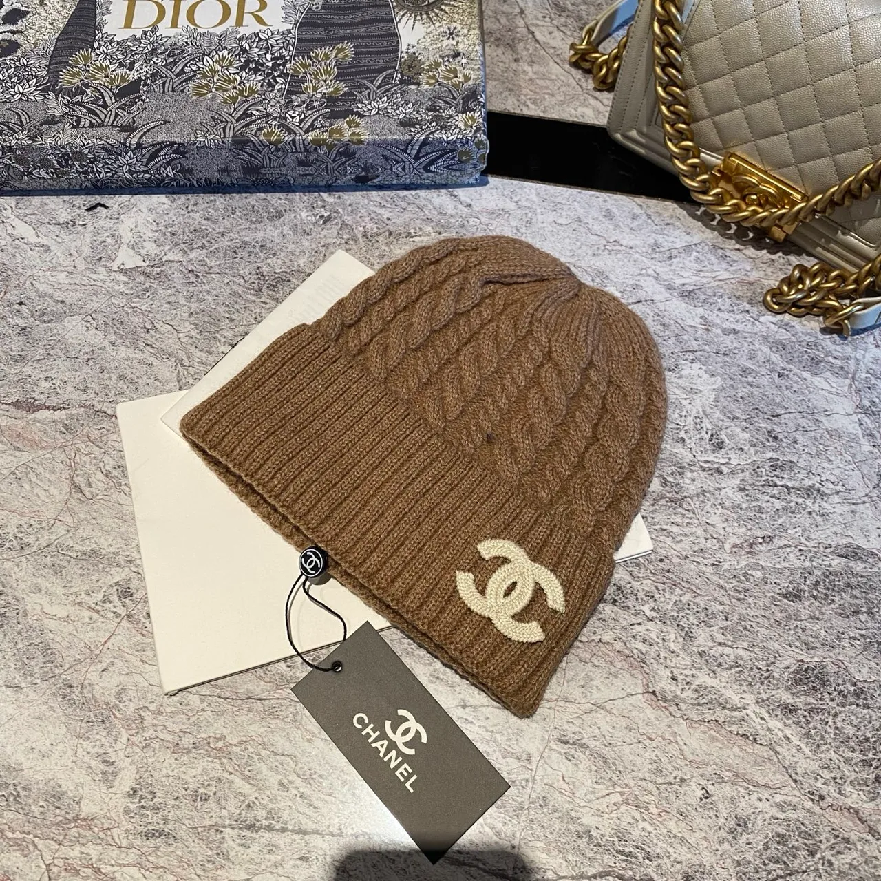 Chanel Cable-knit CC beanie in Black & White & Beige & Tan & Grey · view 4