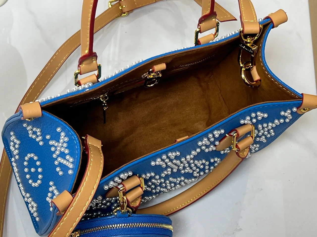 Louis Vuitton Cowhide OnTheGo Tote in Blue · view 8