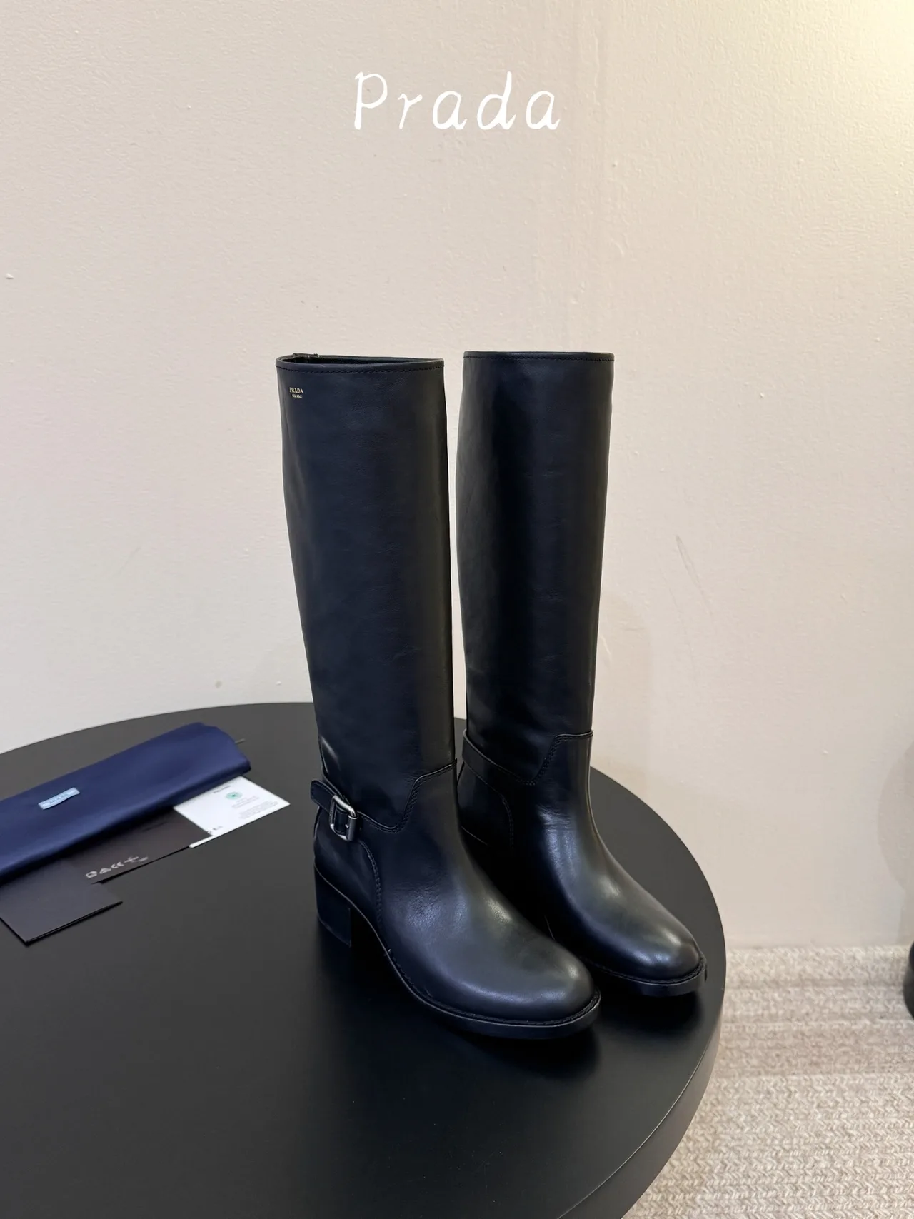 Prada Cowhide Glossy Pointed-Toe Knee-High Boots in Black · view 5