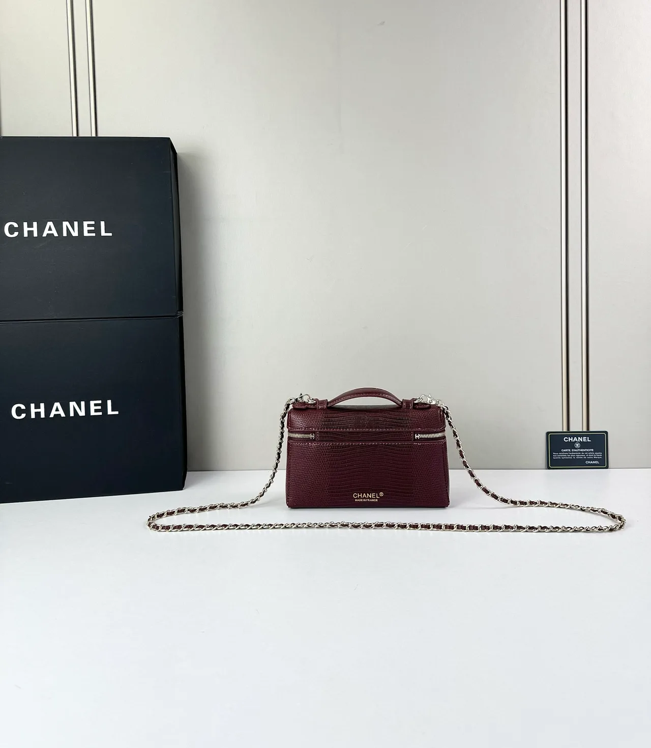 Chanel Cowhide Top-Handle Clutch in Burgundy · view 1