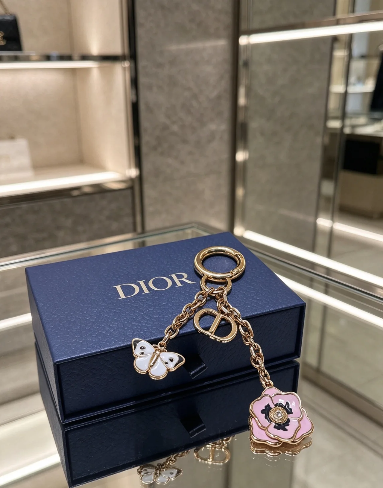 Dior Butterfly and Flower Keychain in Gold · view 2