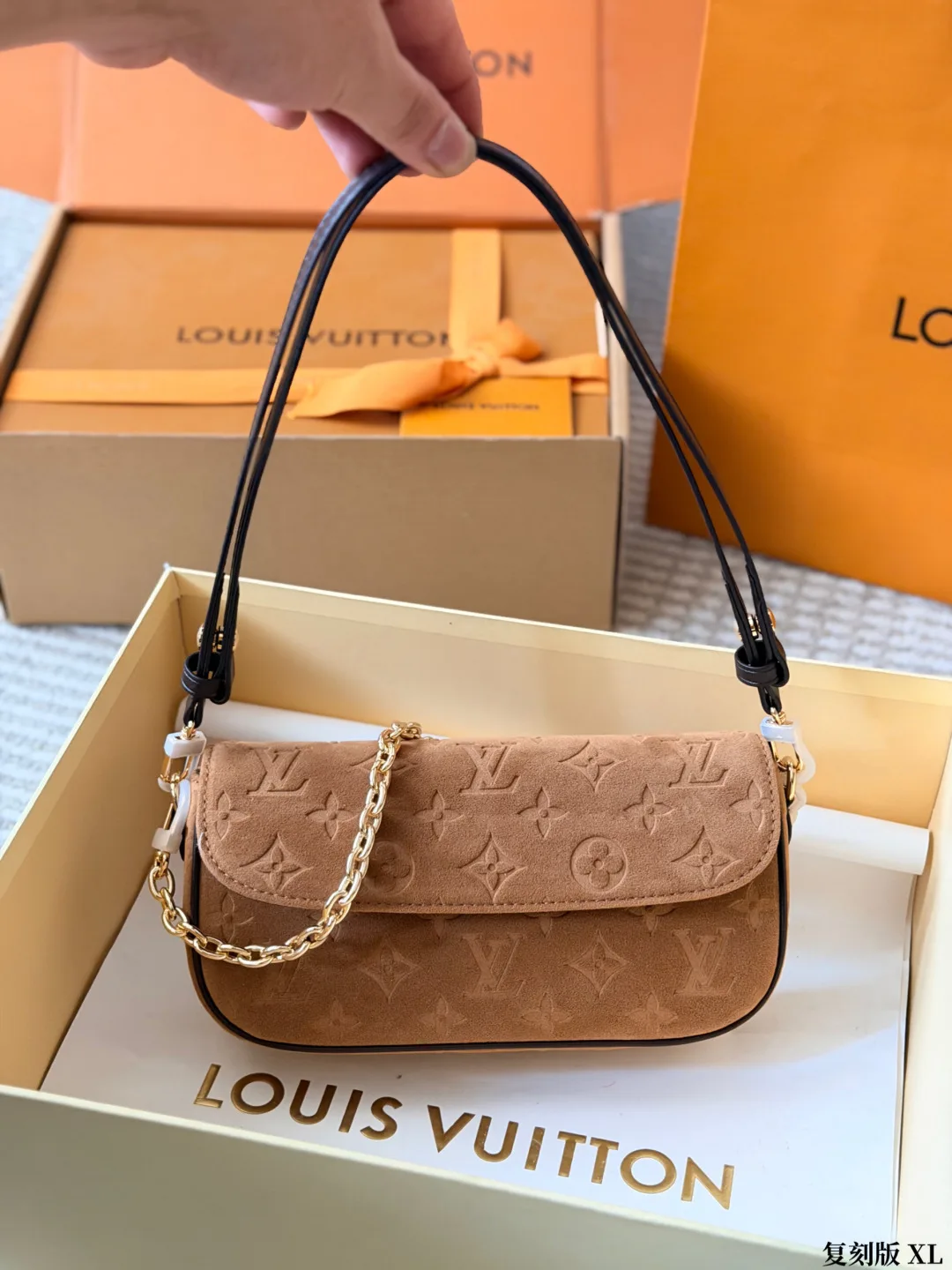 Louis Vuitton Suede Clutch in Tan · view 1
