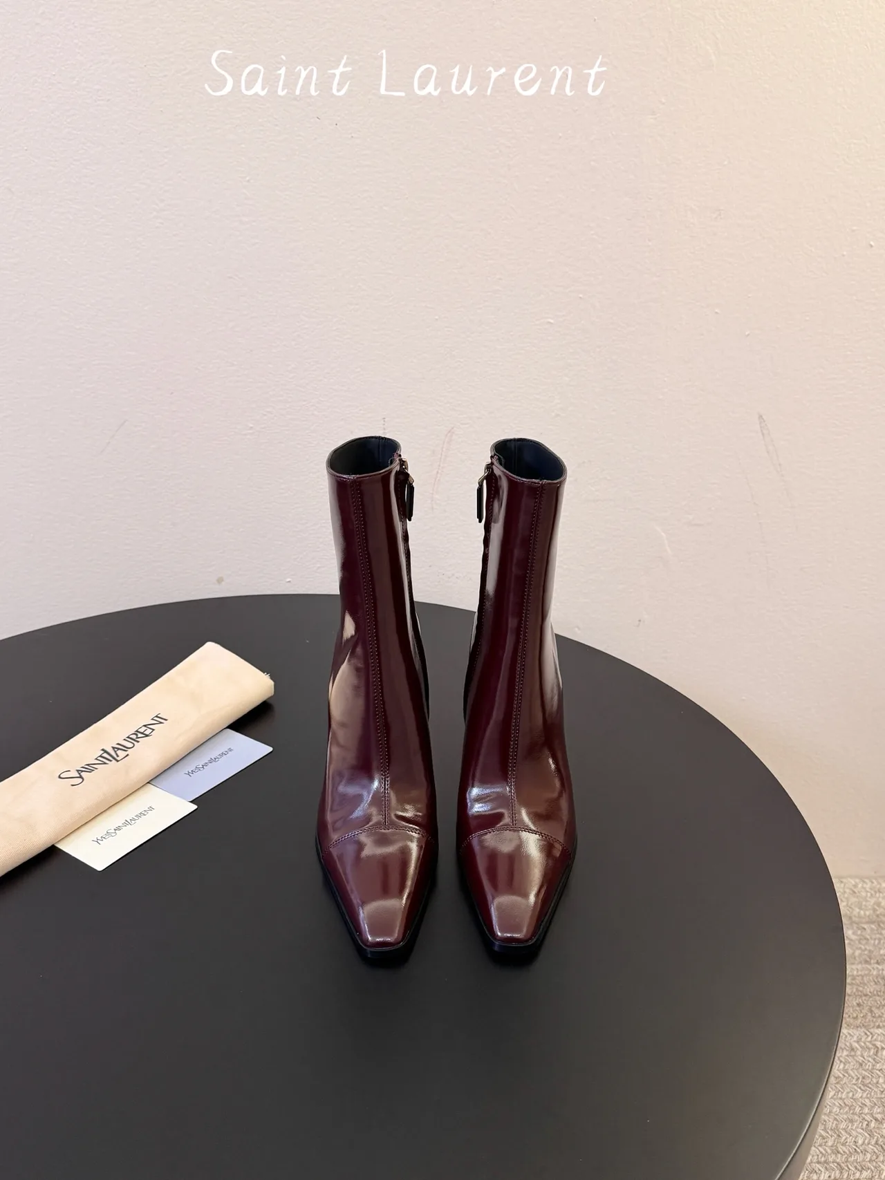 Saint Laurent Glossy Pointed-Toe Ankle Boots in Burgundy · view 1