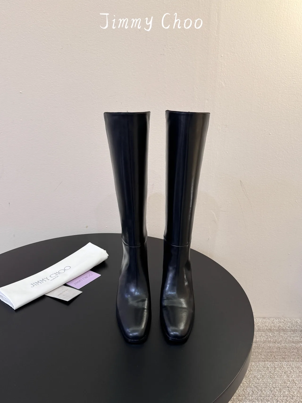 Jimmy Choo Cowhide Round-Toe Knee-High Boots in Black · view 1