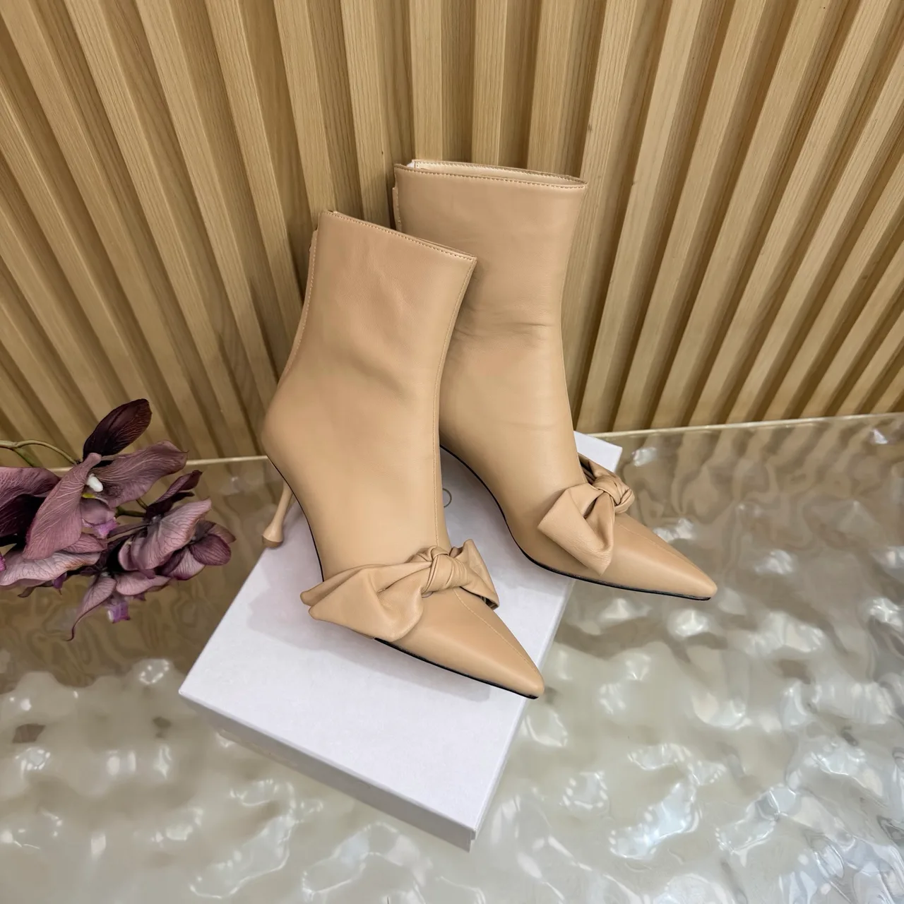 Jimmy Choo Cowhide Glossy Pointed-Toe Bow Ankle Boots in Beige · view 3