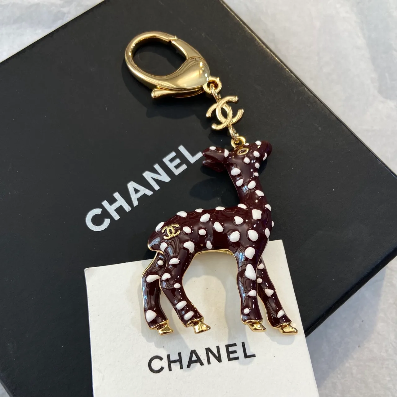 Chanel Deer key charm in Brown & Gold · view 1