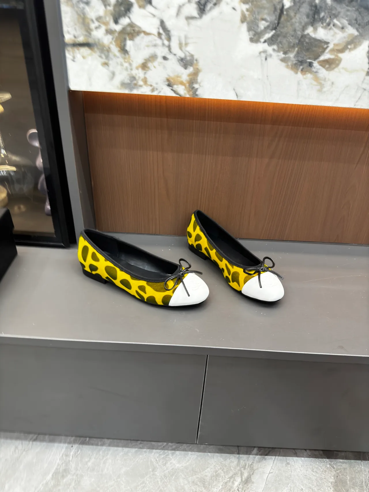 Chanel Patterned cap-toe ballet flats in Yellow & Orange & Tan & White · view 1