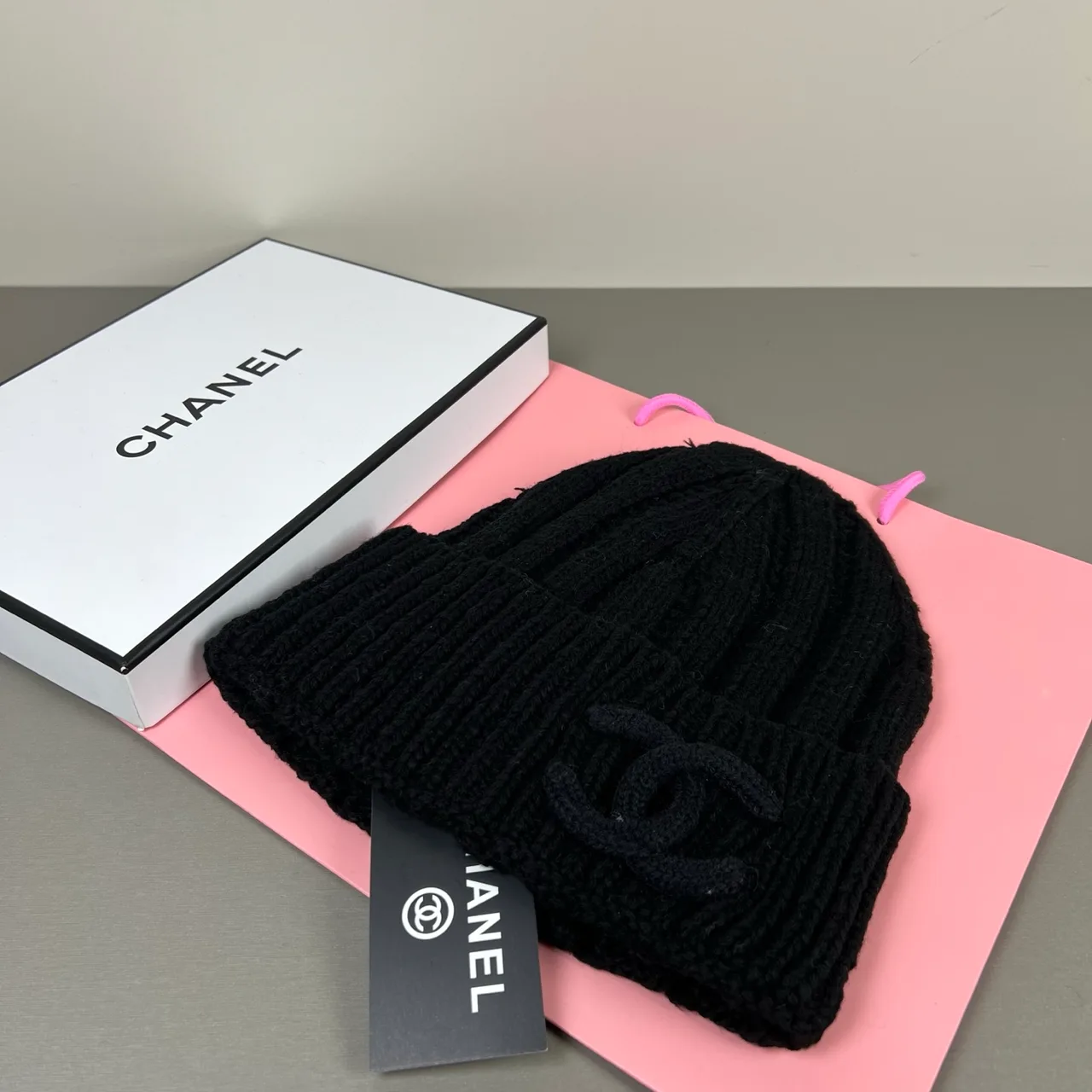Chanel Raised-logo knit beanie in Black & Pink · view 1