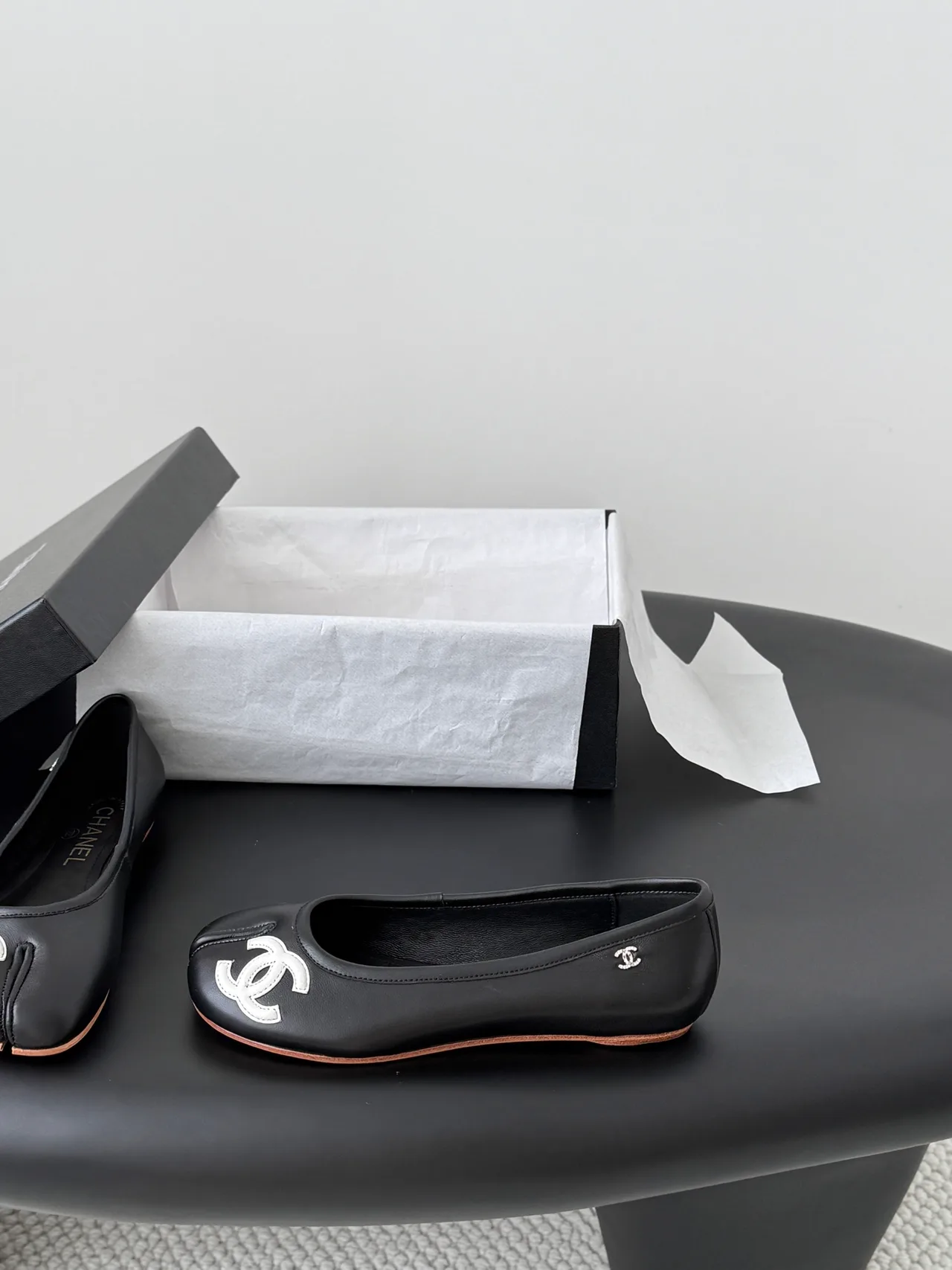 Chanel Cowhide Ballet Flats in Black · view 2