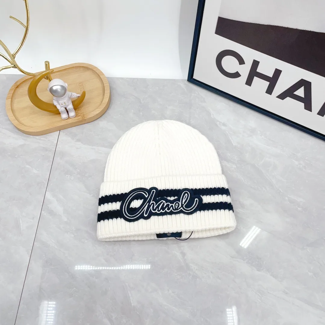 Chanel Striped Embroidered Beanie in White · view 1