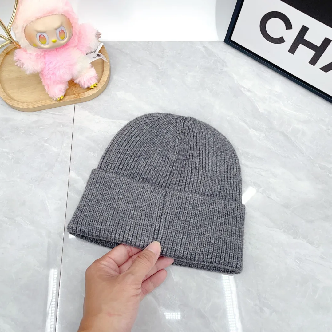 Prada Wool Triangle Logo Knit Beanie in Grey · view 6