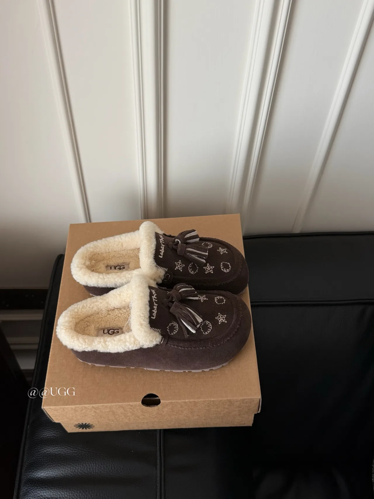 UGG Cowhide Slippers in Brown · view 1
