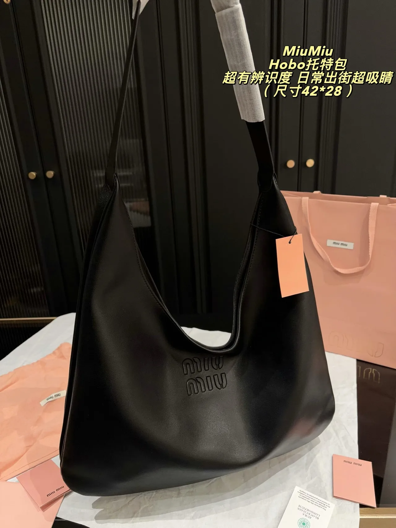 Miu Miu Cowhide Glossy Hobo Bag in Black · view 2
