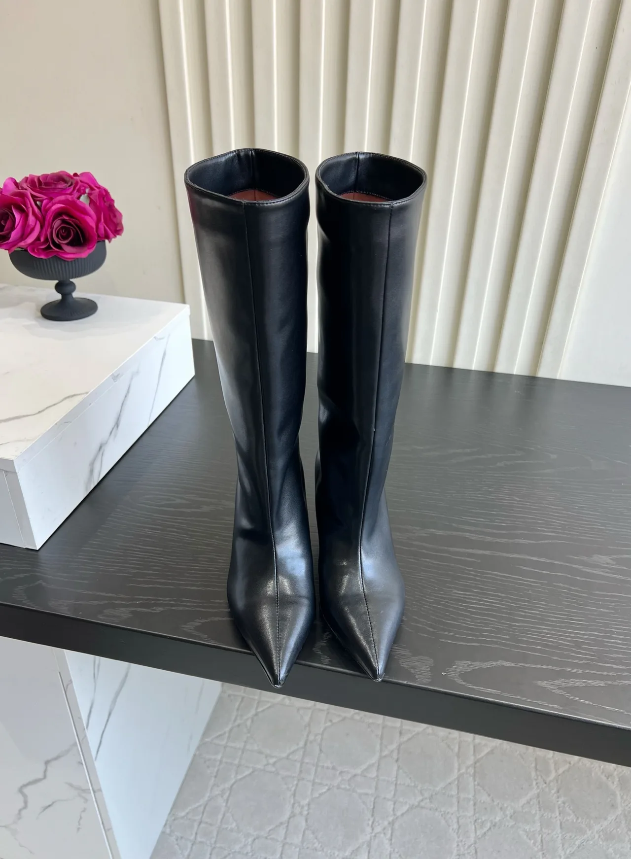 Amina Muaddi Cowhide Glossy Pointed-Toe Knee-High Boots in Black · view 1