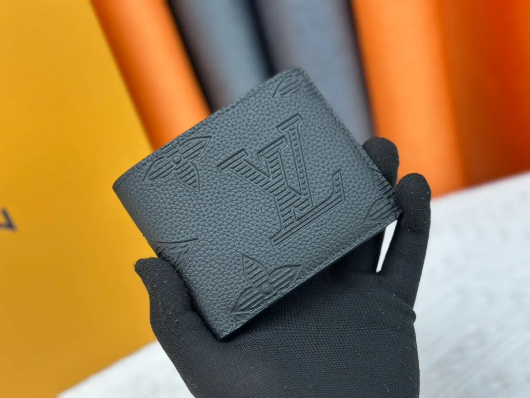Louis Vuitton Leather Bifold Wallet in Grey · view 1