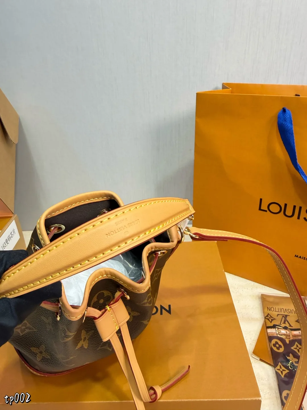 Louis Vuitton Nano Noe Bucket Bag in Brown · view 6