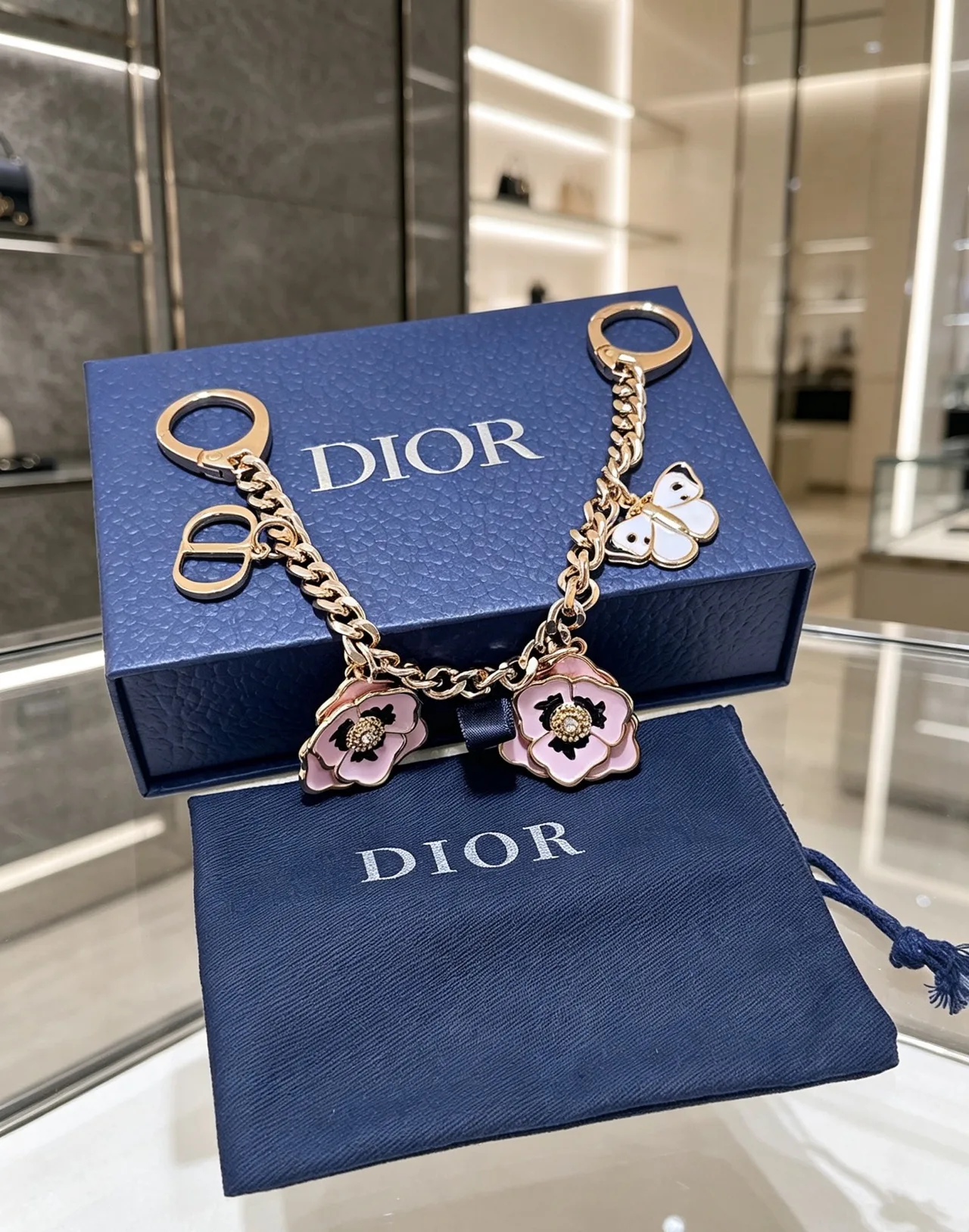 Dior Floral Butterfly Bag Charm in Gold · view 1