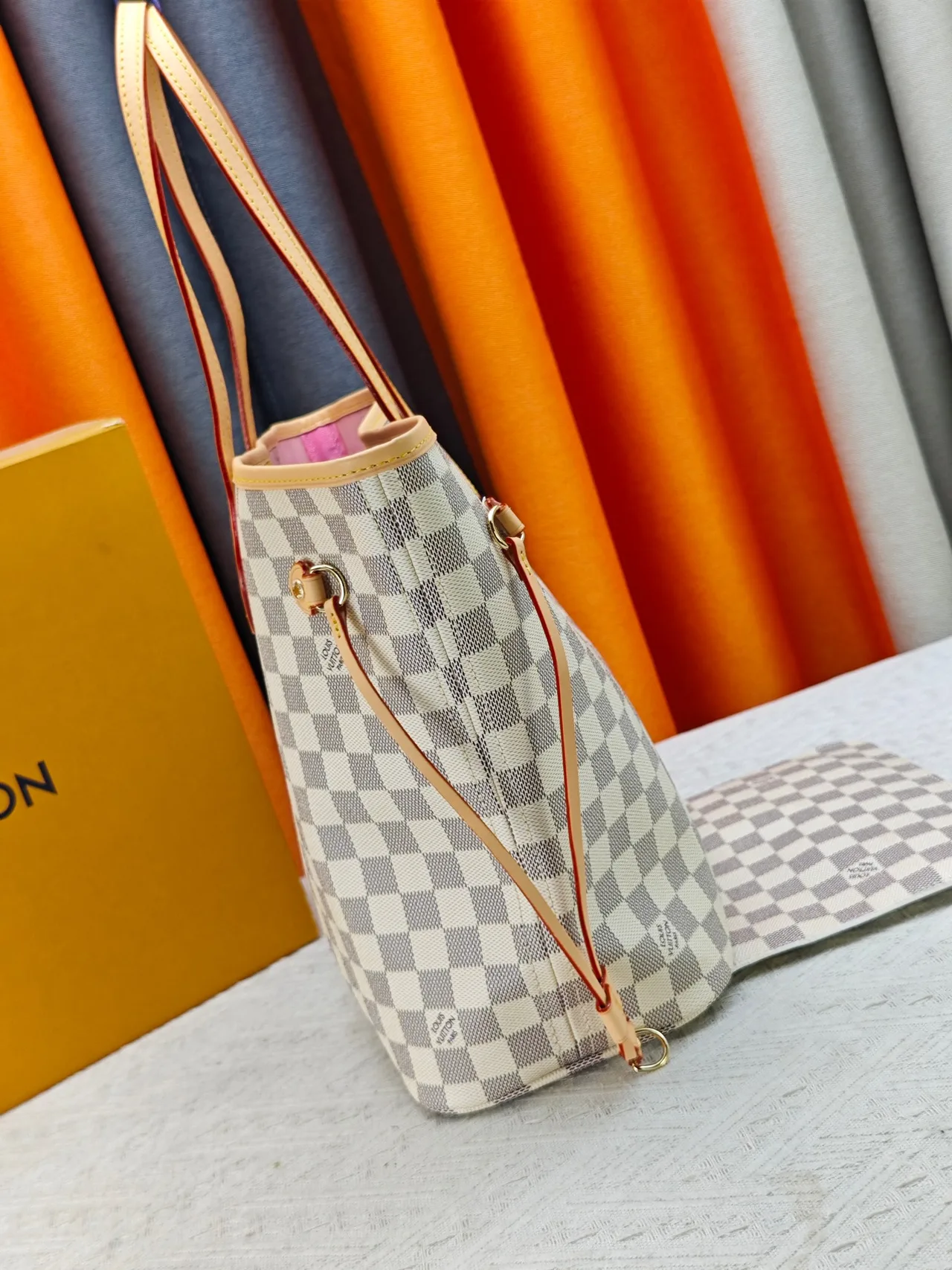 Louis Vuitton Neverfull Clutch in Grey · view 3