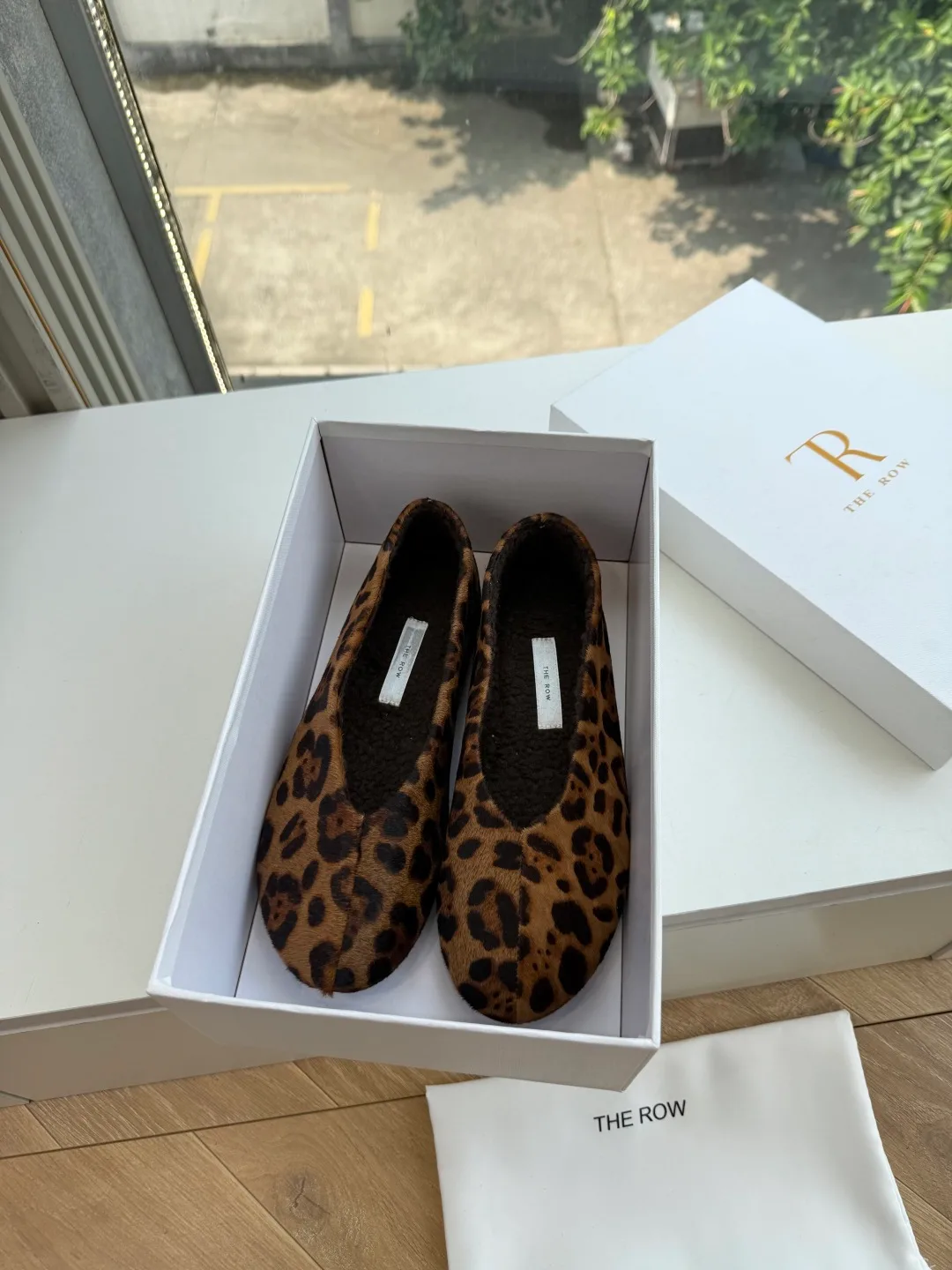 The Row Cowhide Smooth Round-Toe Loafers in Brown · view 1