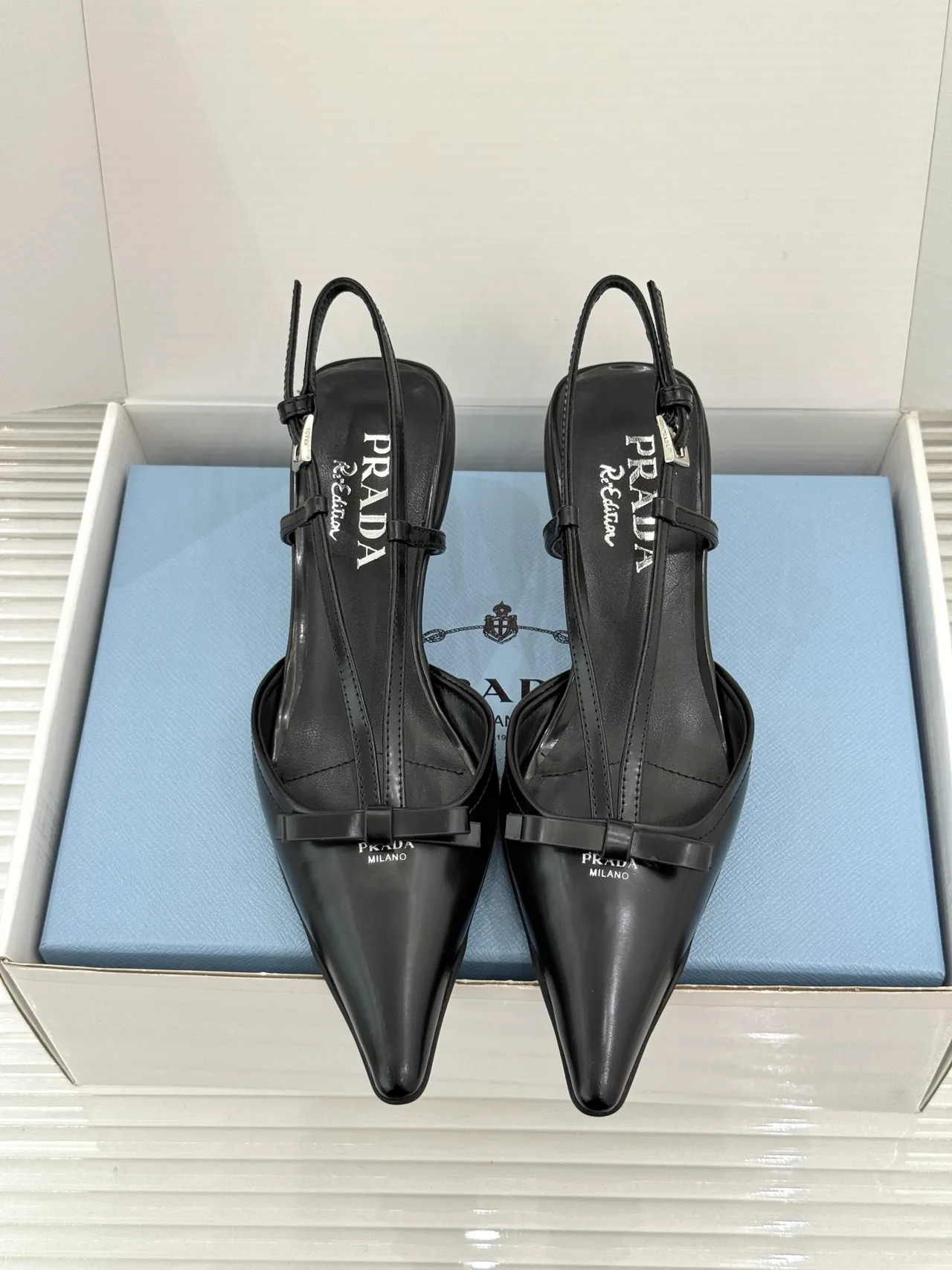 Prada Lambskin Pointed Slingback Pumps in Black · view 1
