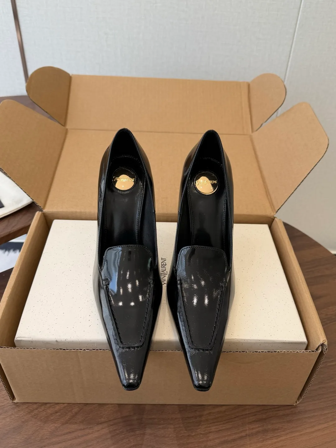 Saint Laurent Cowhide Glossy Pointed-Toe Pumps in Black · view 1
