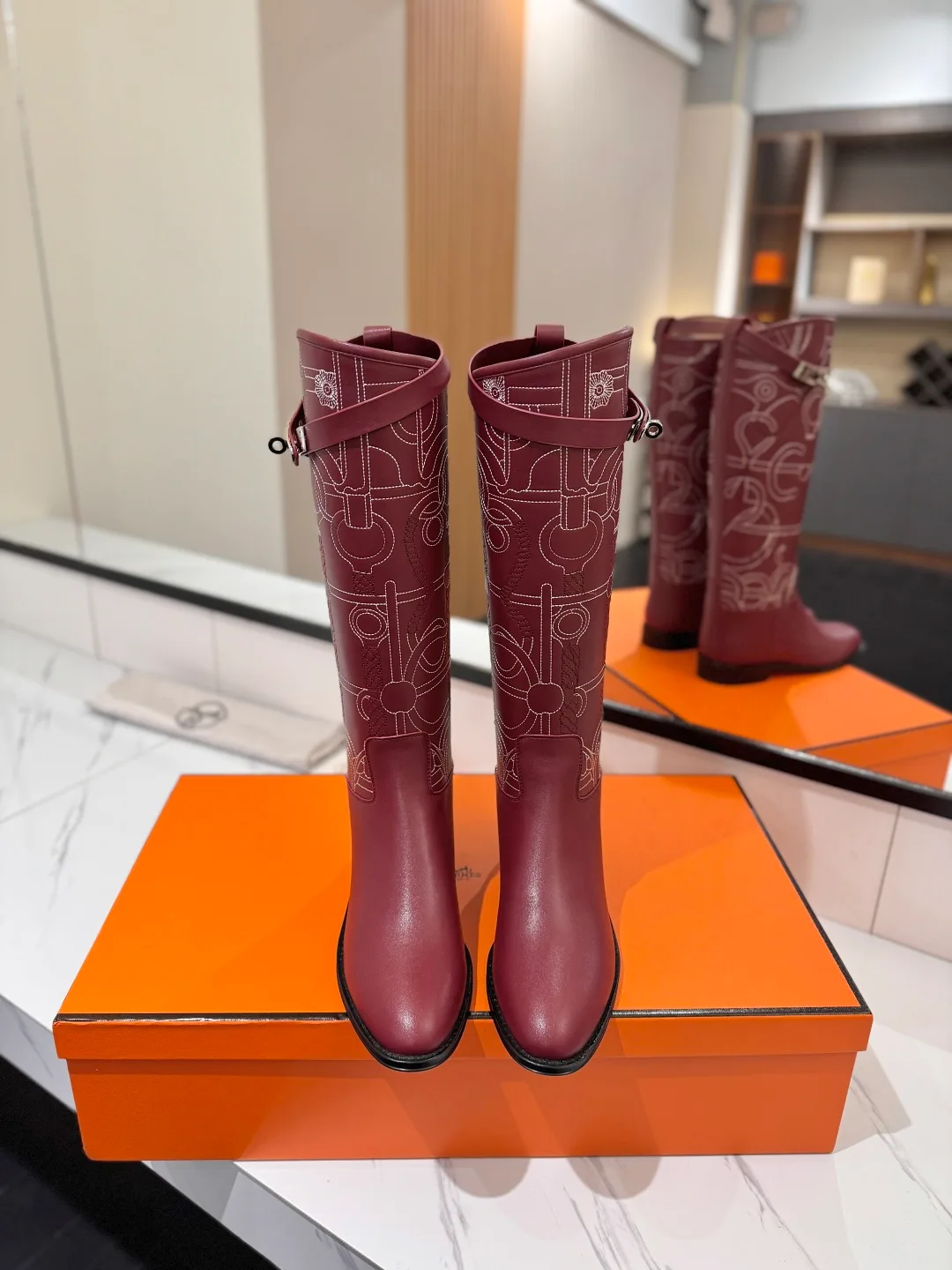 Hermes Cowhide Boots in Burgundy · view 3
