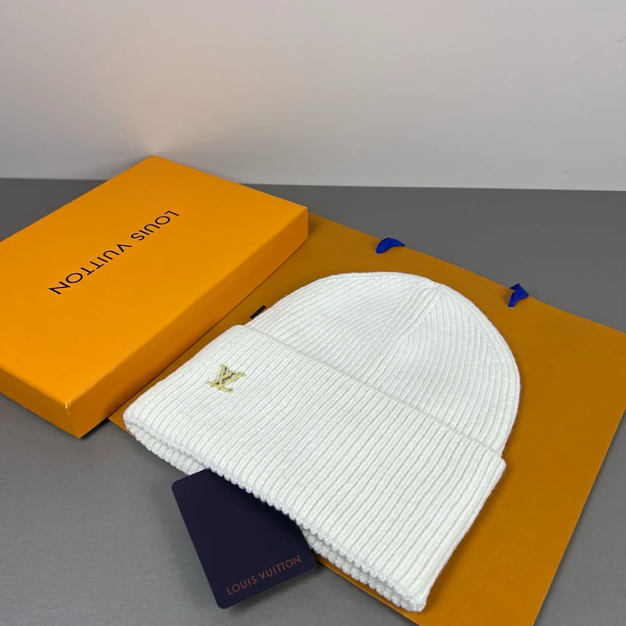 Louis Vuitton Small-logo knit beanie in White & Blue · view 1