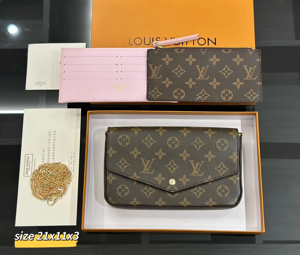 Louis Vuitton Chain Wallet in Brown / White / Pink / Beige / Grey · view 1