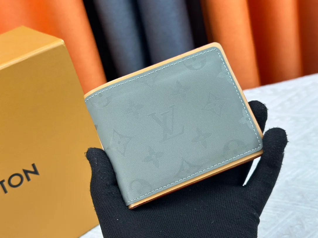 Louis Vuitton Canvas Monogram Bifold Wallet in Grey · view 1