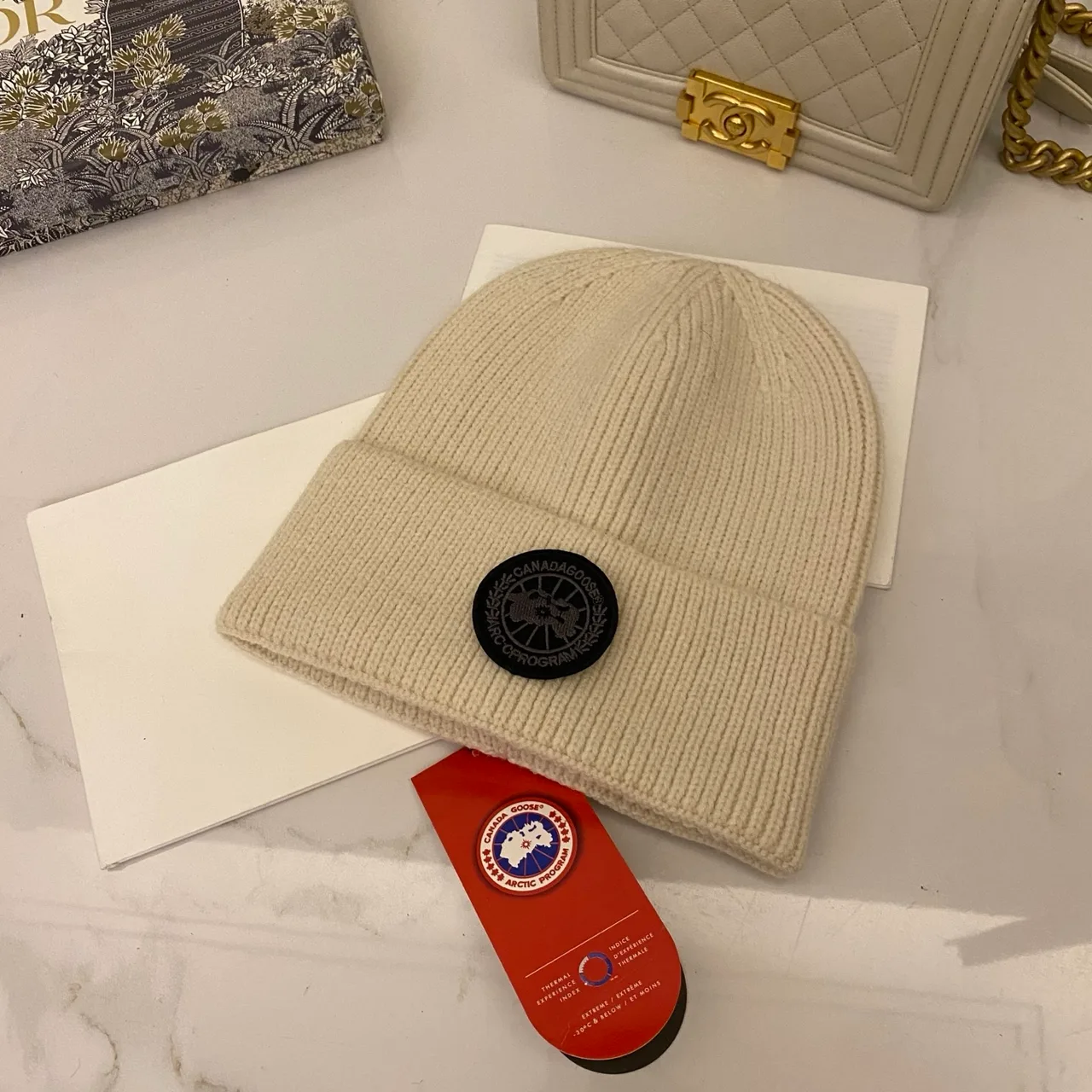 Canada Goose Logo knit beanie in Red & Blue & Yellow & Orange & Pink & Grey & White & Black & Tan & Cream · view 8