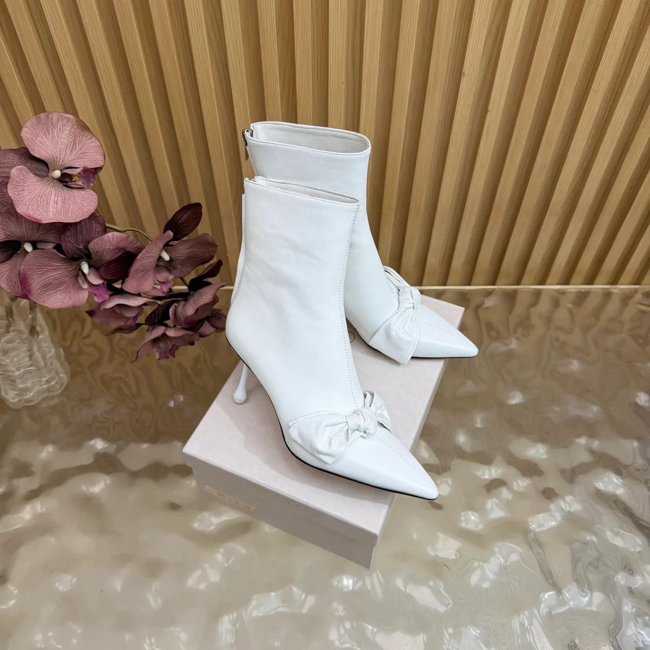 Jimmy Choo Cowhide Glossy Pointed-Toe Bow Ankle Boots in White · view 3