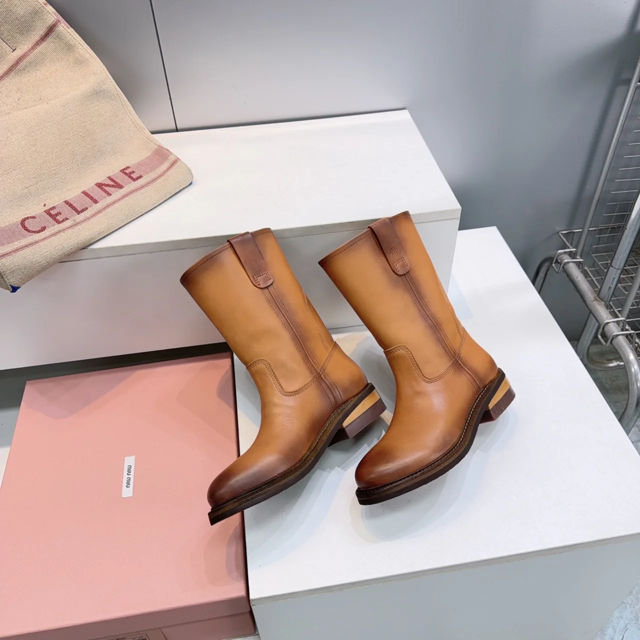 Miu Miu Cowhide Smooth Round-Toe Mid-Calf Boots in Brown · view 4