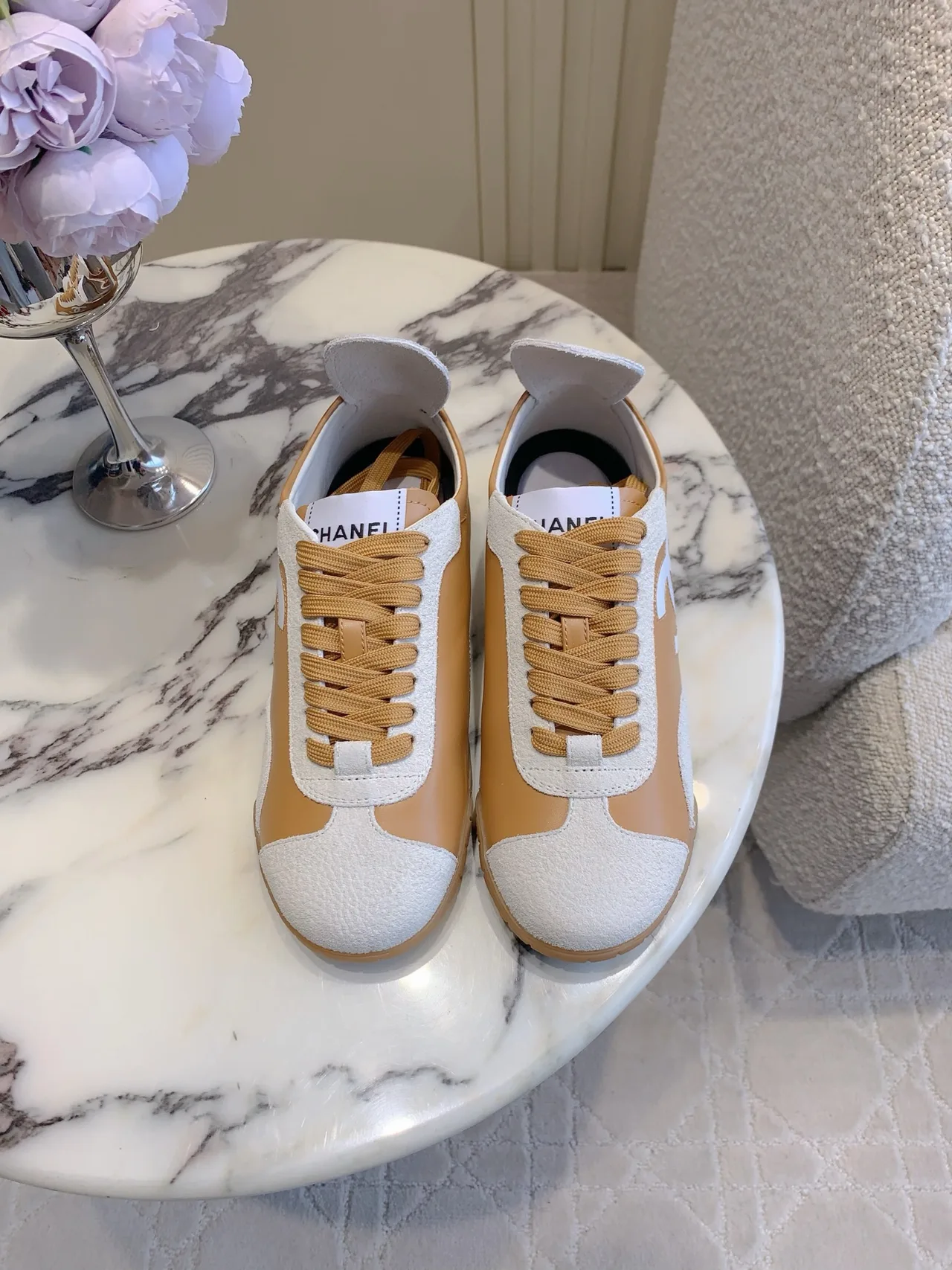 Chanel Calfskin Sneakers in Tan · view 1