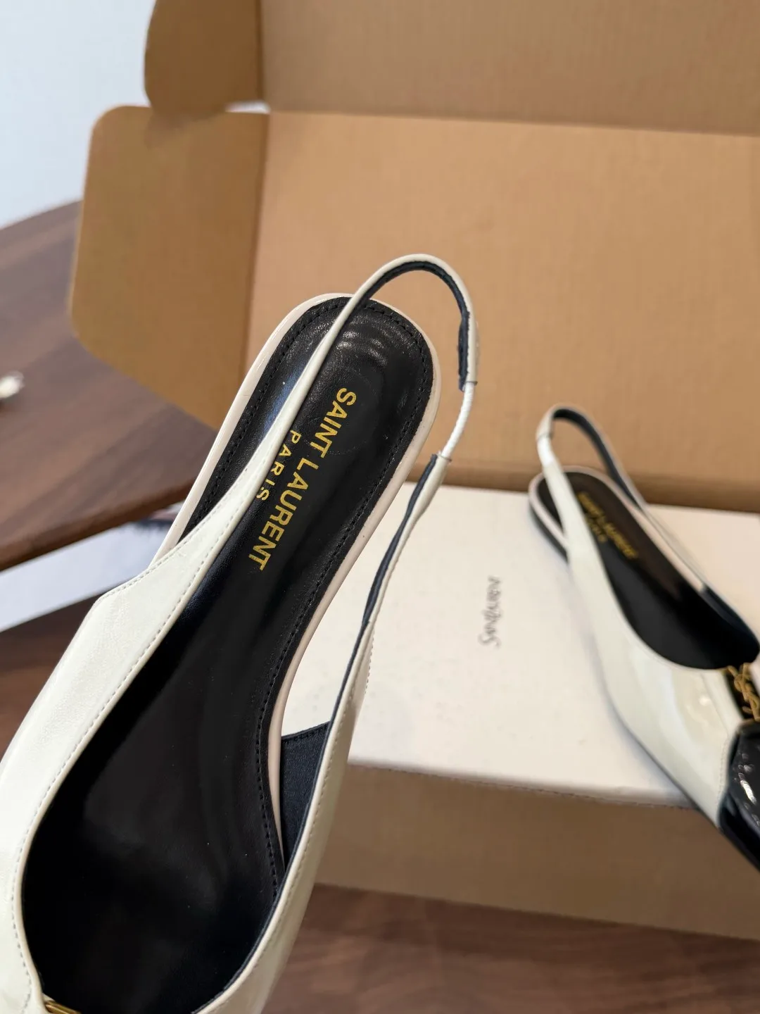 Saint Laurent Sheepskin Glossy Pointed-Toe Toe-Cap Slingback Pumps in White · view 7