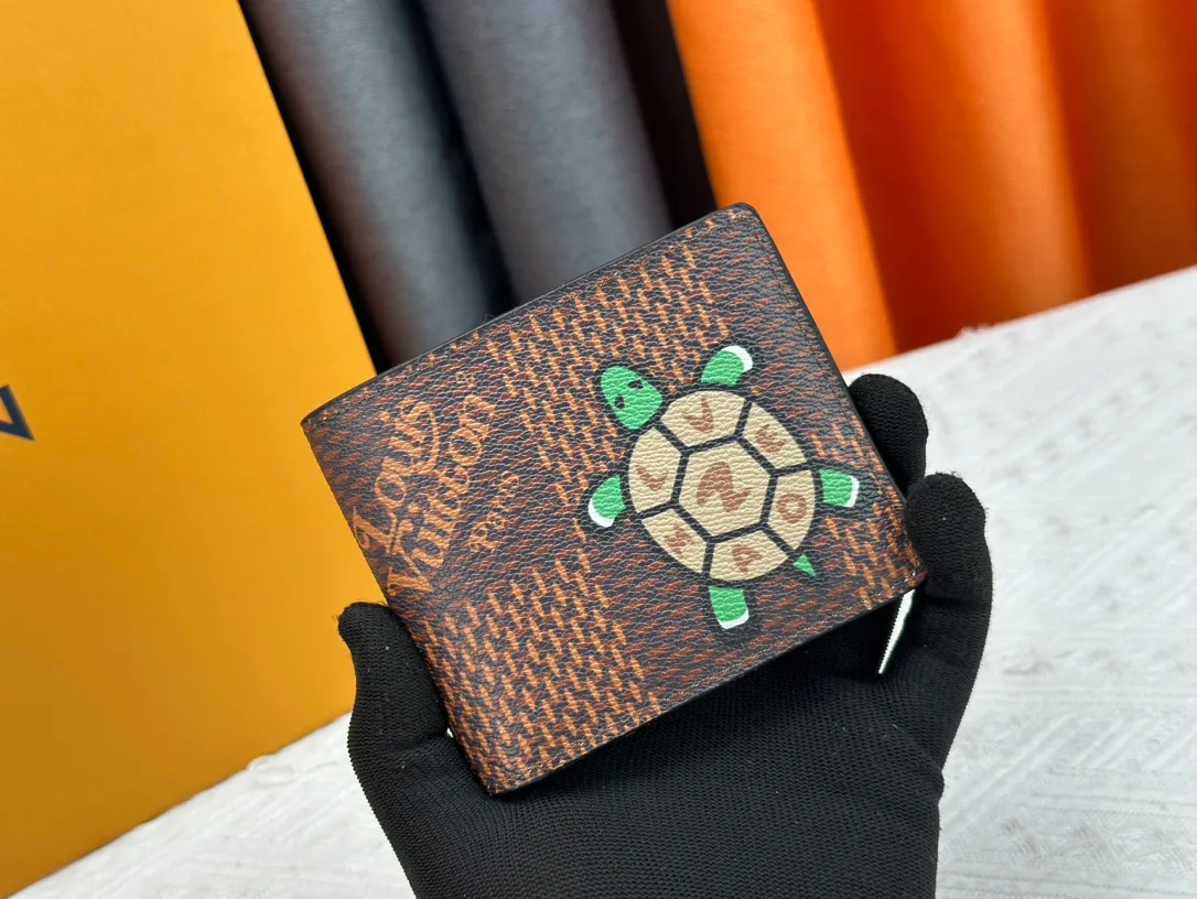 Louis Vuitton Calfskin Bifold Wallet in Brown · view 1