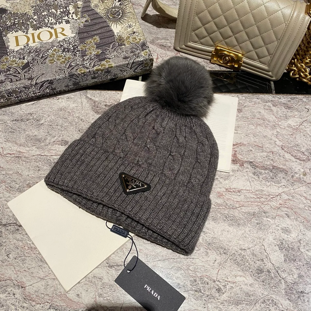 Prada Cable knit pom beanie in Black & White & Grey & Brown & Cream & Blue & Burgundy & Pink · view 3