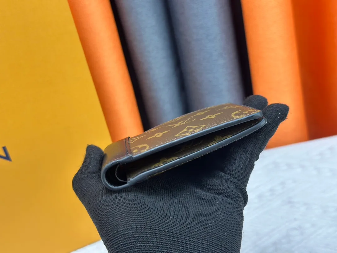 Louis Vuitton Cowhide Canvas Smooth Bifold Wallet in Brown · view 5