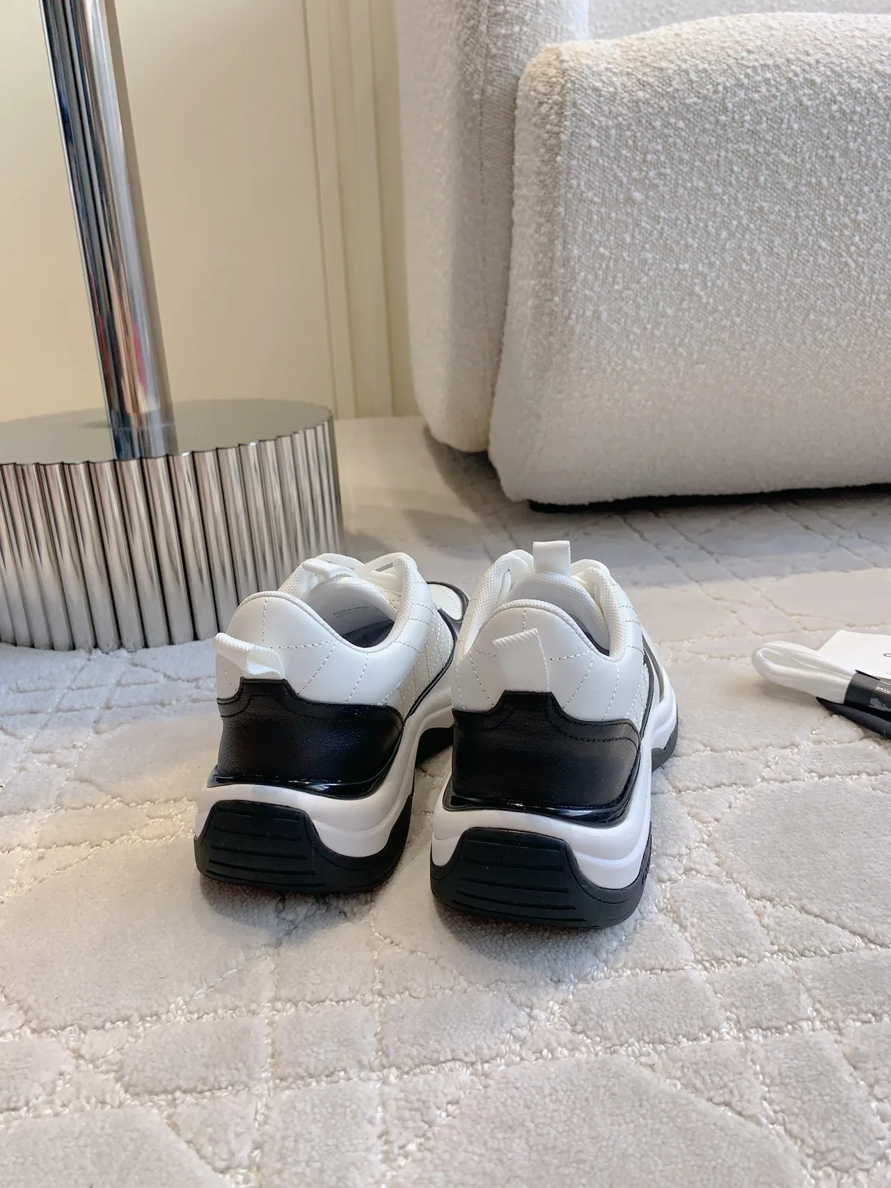 Chanel Quilted Sneakers in White · view 8