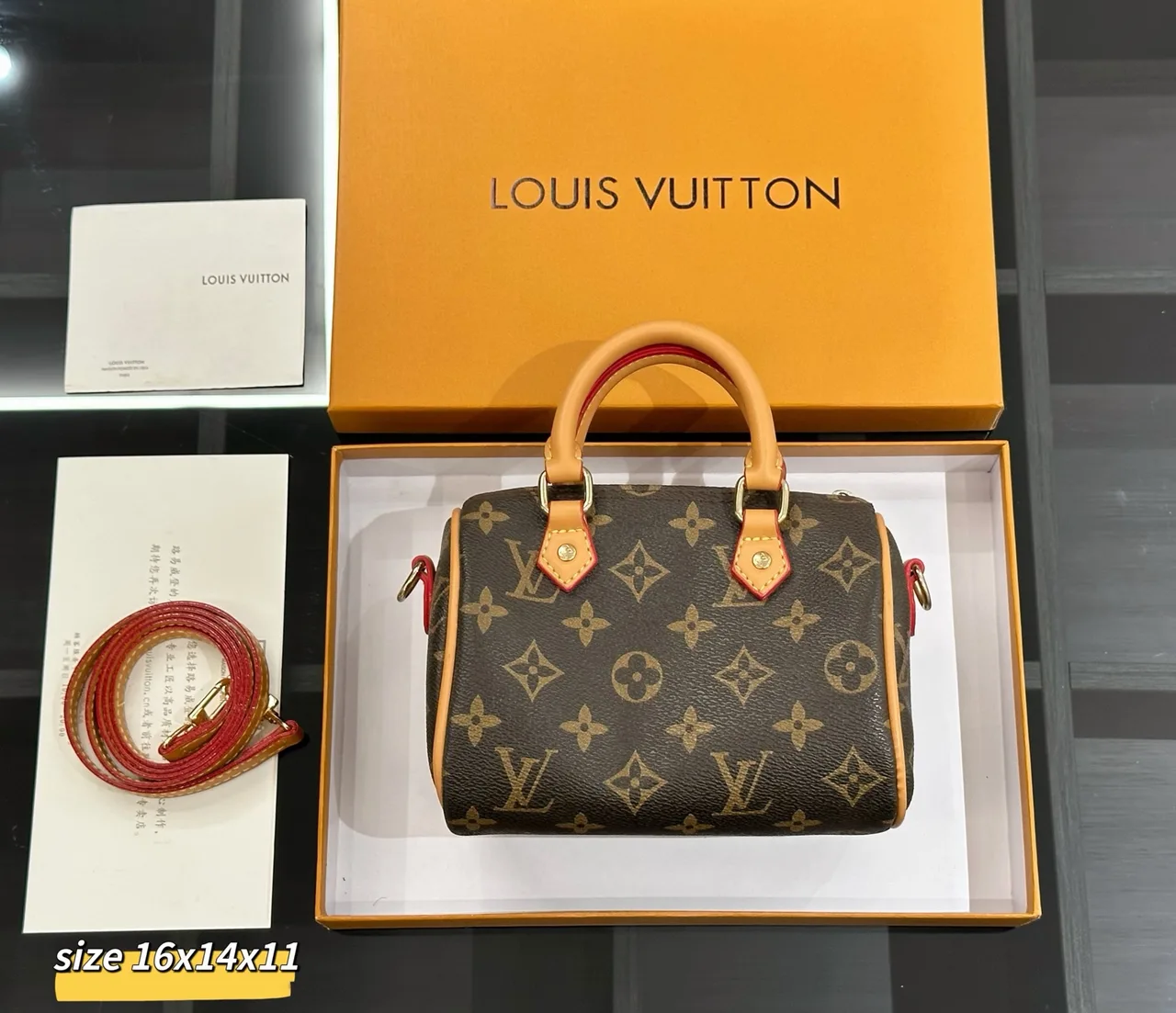 Louis Vuitton Alma Bag in Brown / White / Beige / Yellow · view 2