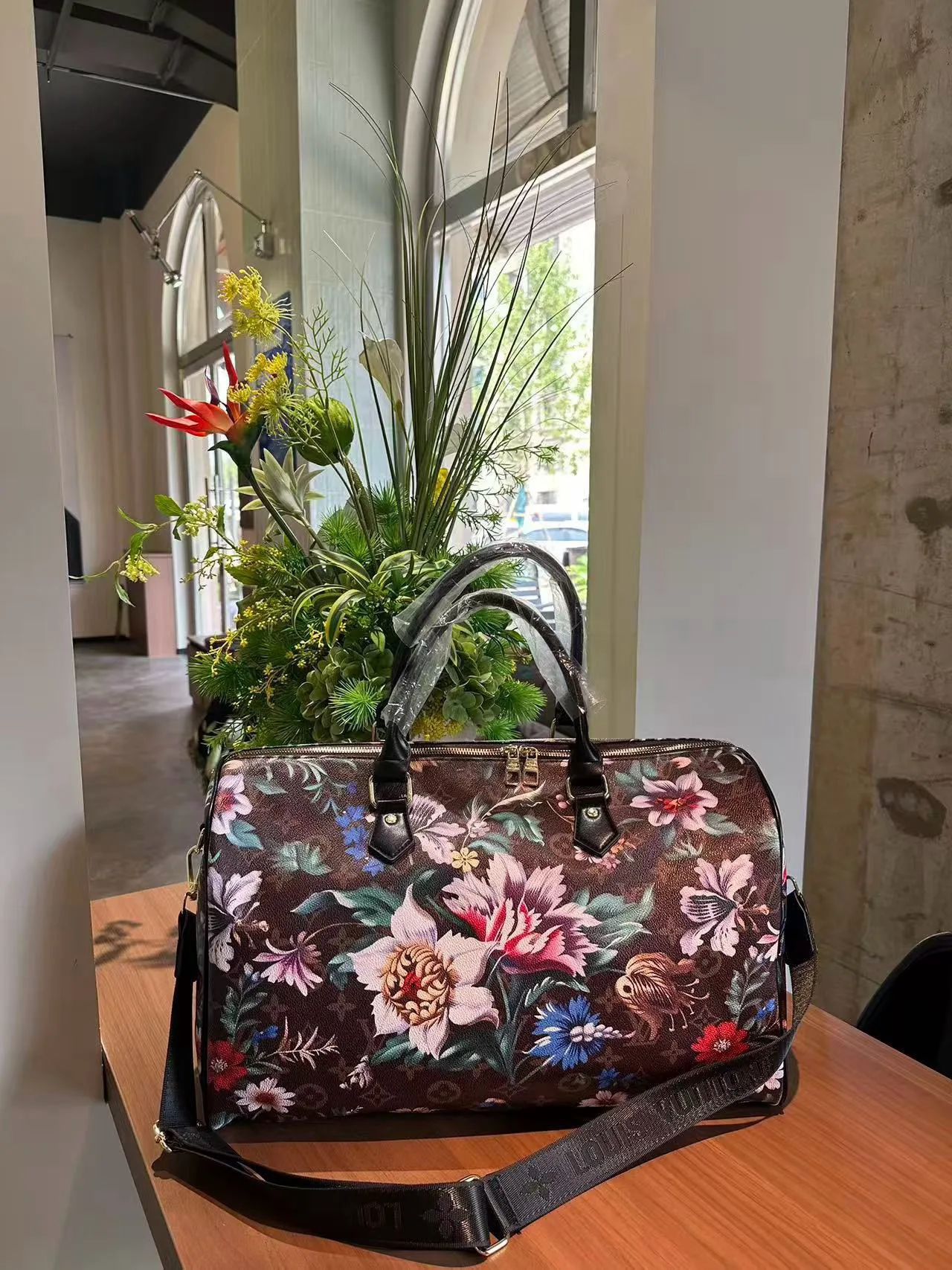 Louis Vuitton Floral Monogram Duffel Bag in Brown · view 5